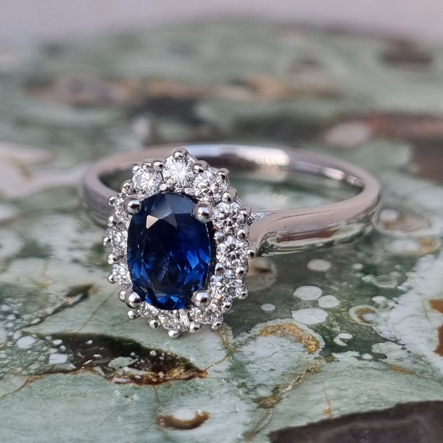 Blue Sapphire and Diamond White Gold Halo Ring