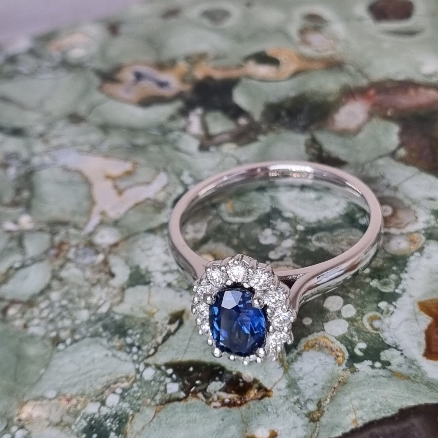 Blue Sapphire and Diamond White Gold Halo Ring