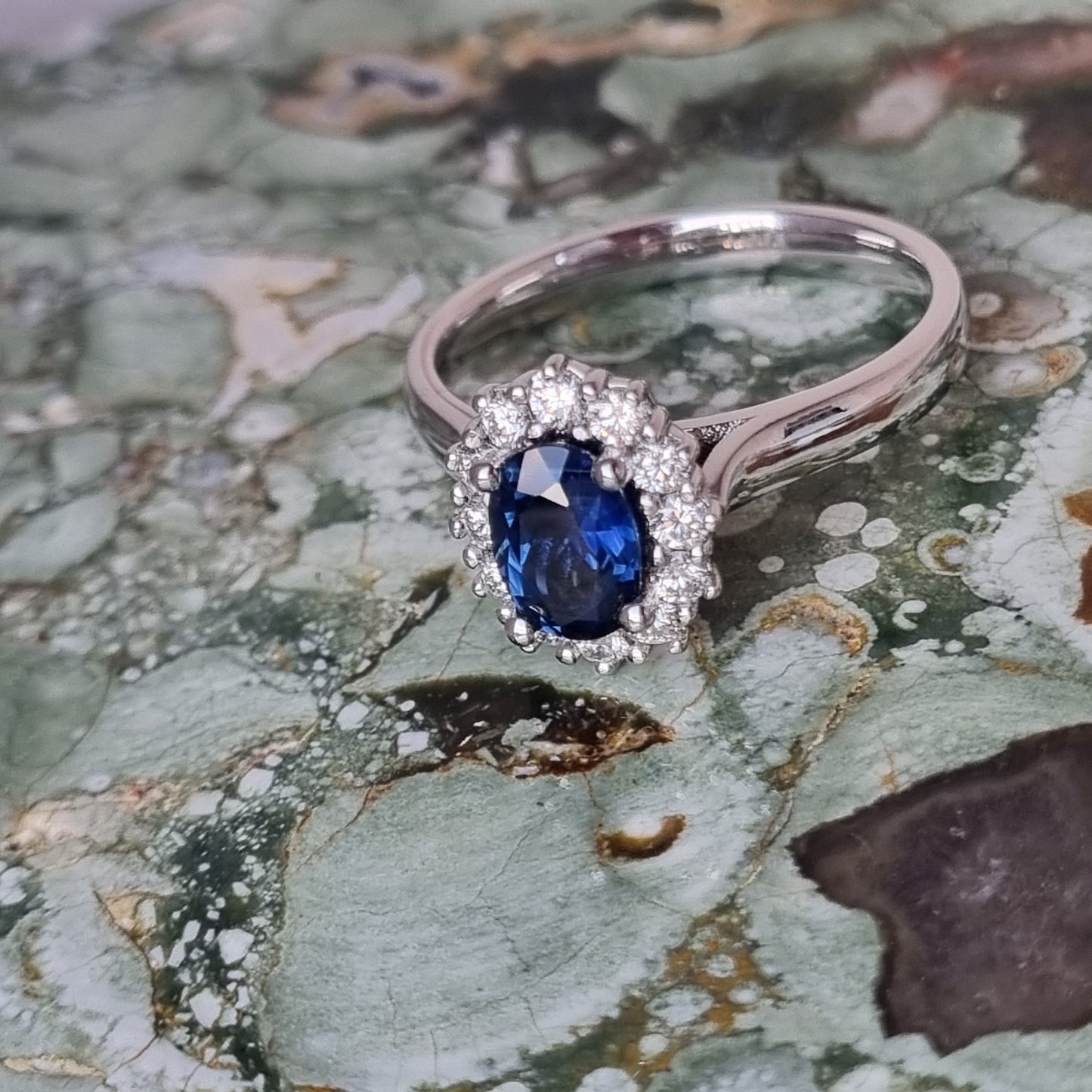 Blue Sapphire and Diamond White Gold Halo Ring