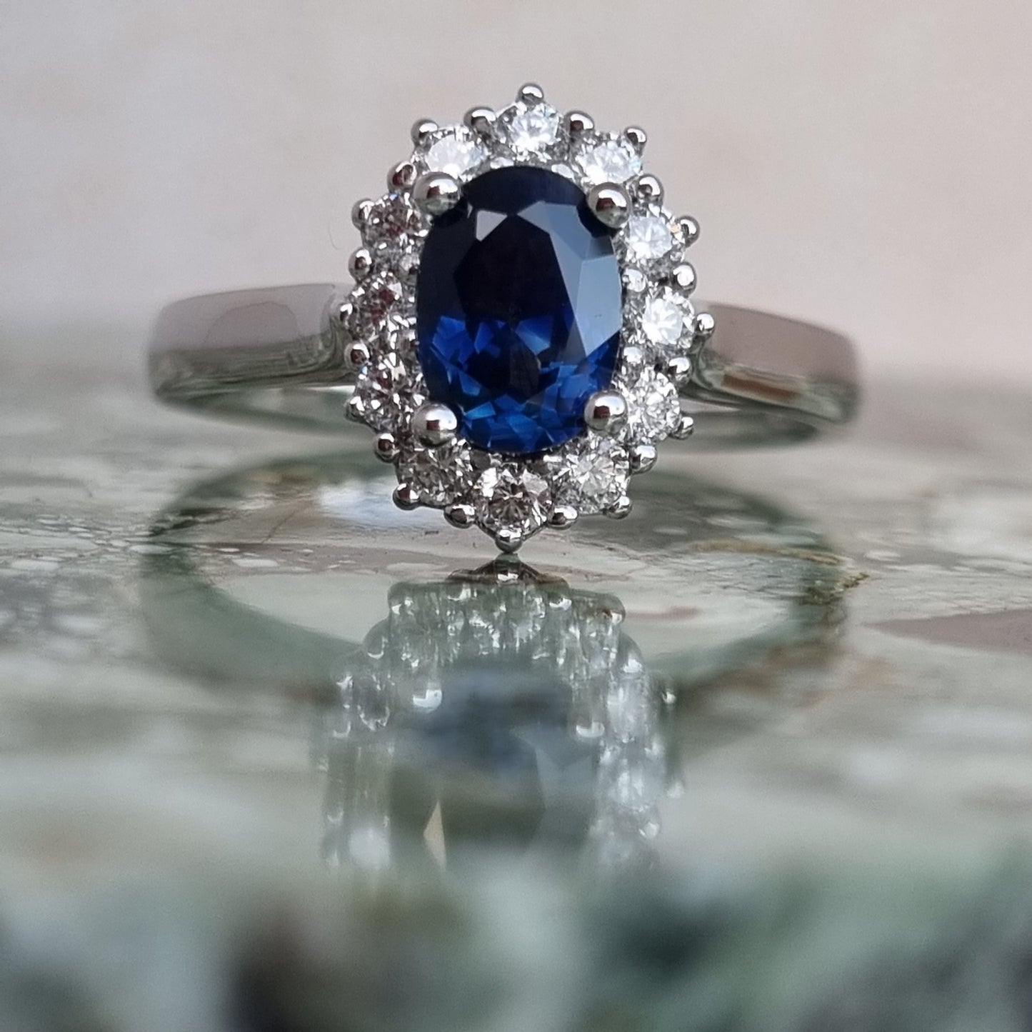 Blue Sapphire and Diamond White Gold Halo Ring