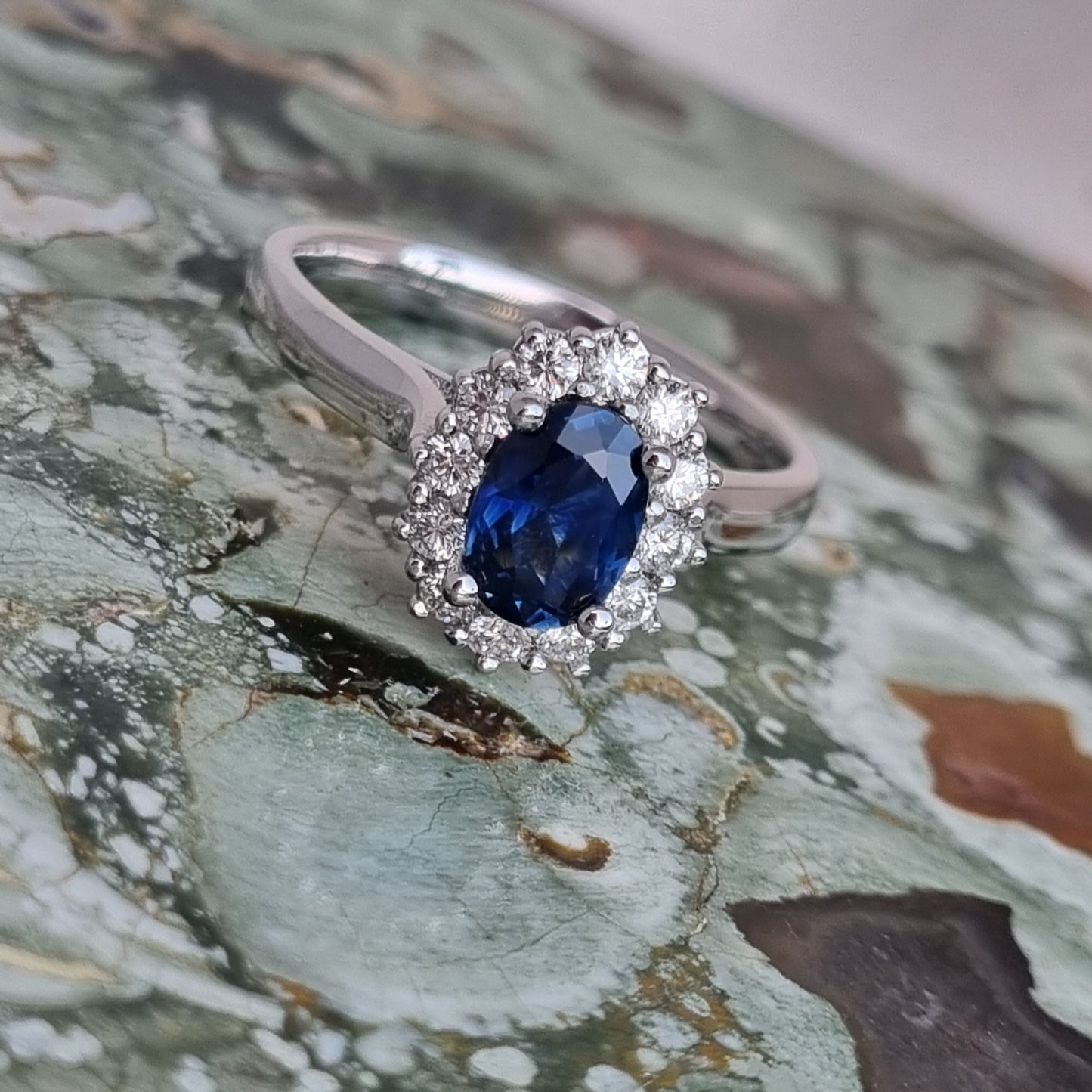 Blue Sapphire and Diamond White Gold Halo Ring