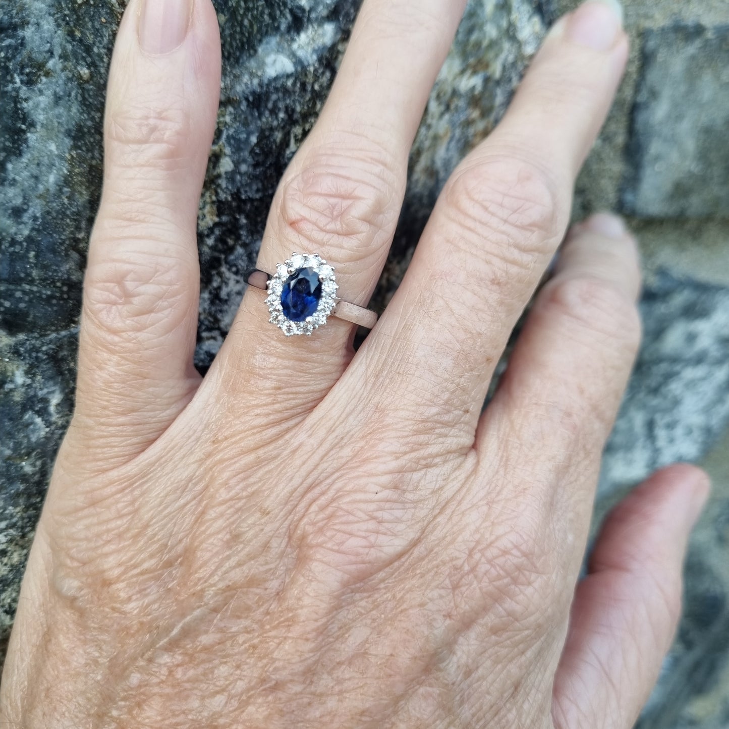 Blue Sapphire and Diamond White Gold Halo Ring