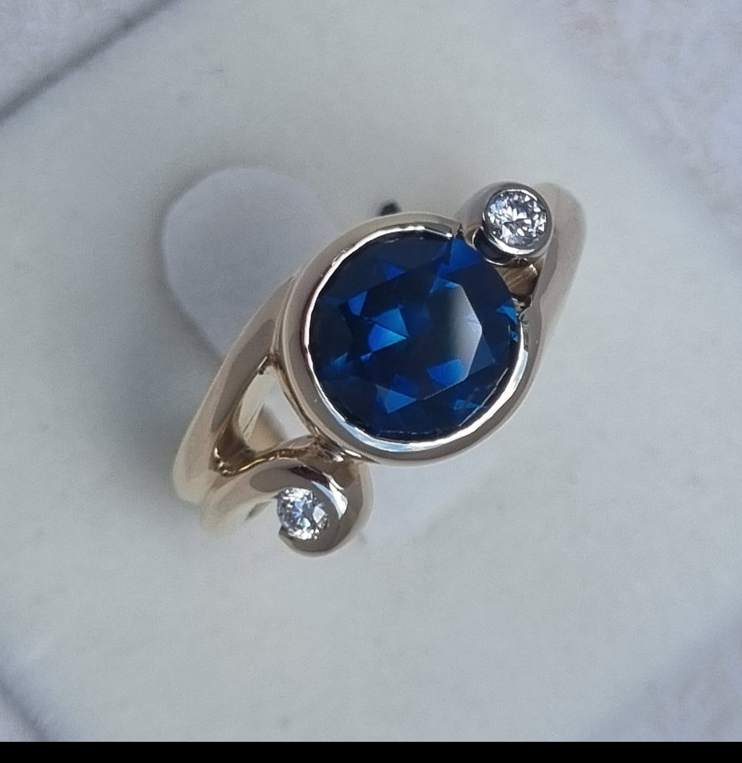 Gold Curls Design Ring with Blue Sapphire and Diamonds Design Ref: EBS467-6