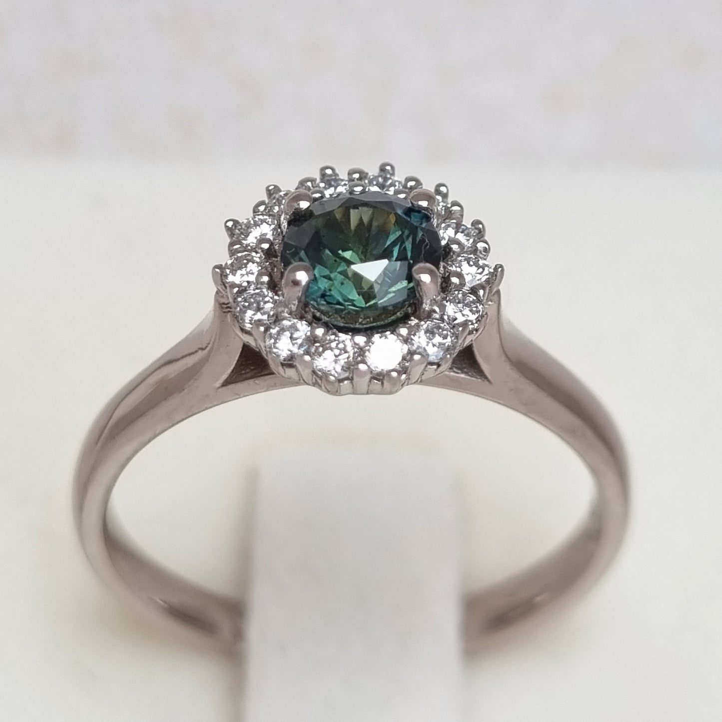 Dark Green Sapphire and Diamond Classic claw set Halo design White Gold ring Design Ref: D359