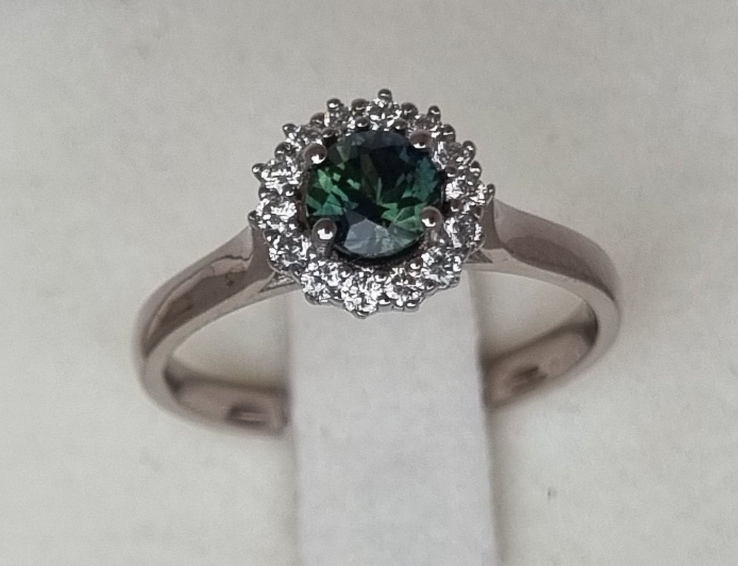 Dark Green Sapphire and Diamond Classic claw set Halo design White Gold ring Design Ref: D359