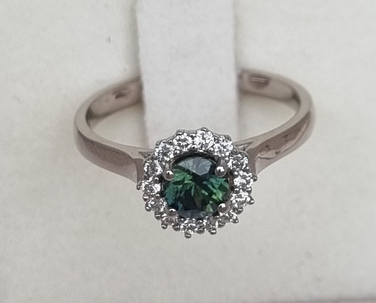 Dark Green Sapphire and Diamond Classic claw set Halo design White Gold ring Design Ref: D359