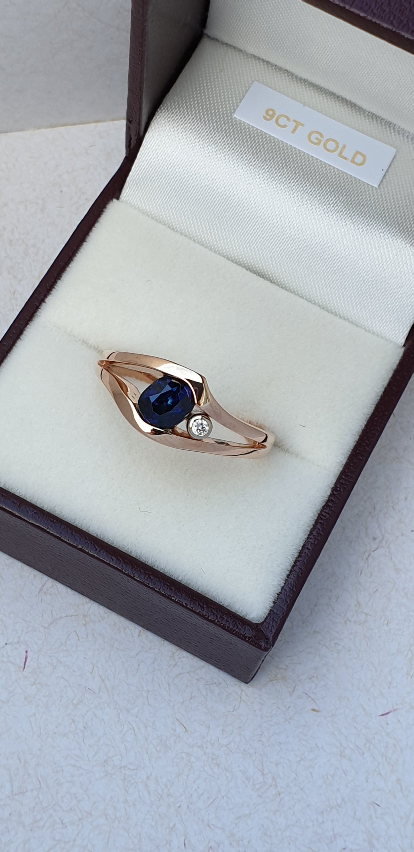 Blue Sapphire & Diamond Suspension Style Ring