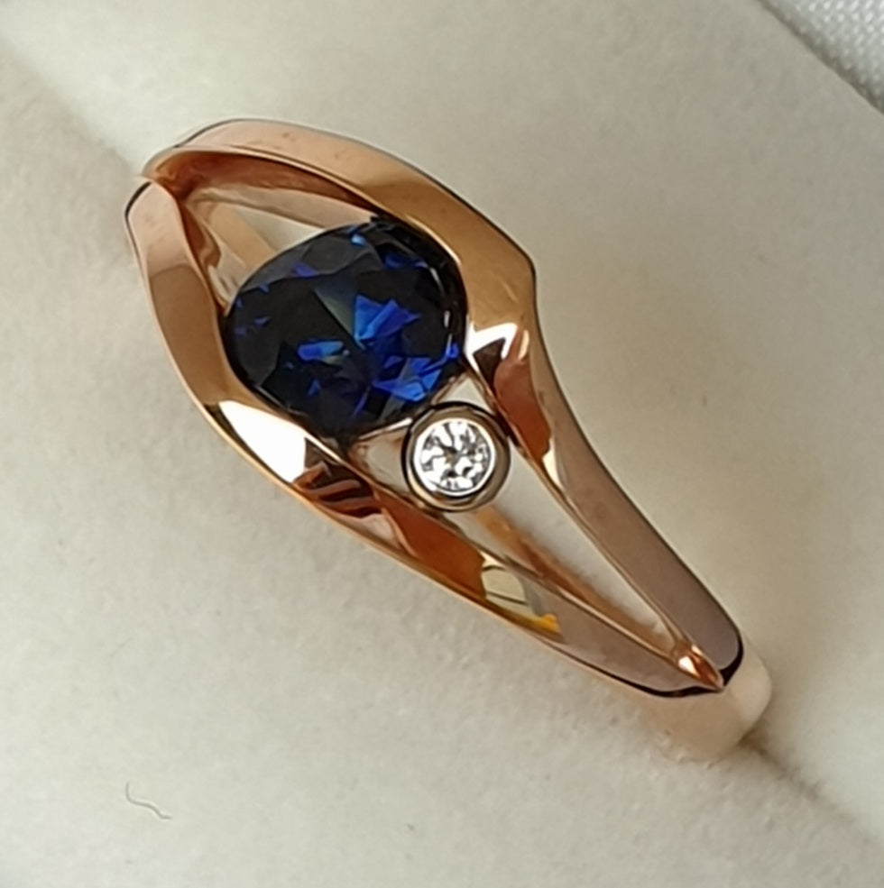 Blue Sapphire & Diamond Suspension Style Ring