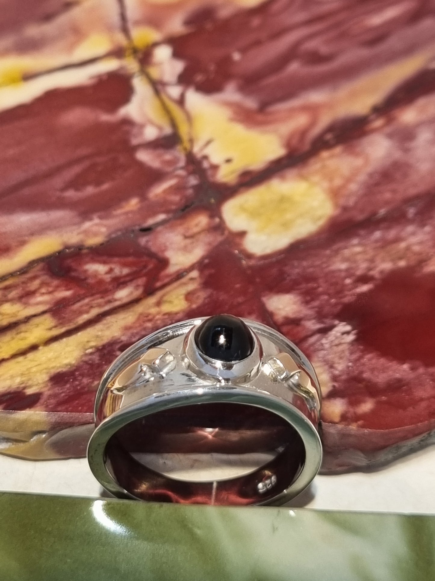 Solitaire Natural Black Star Sapphire Ring with Rose Gold accents