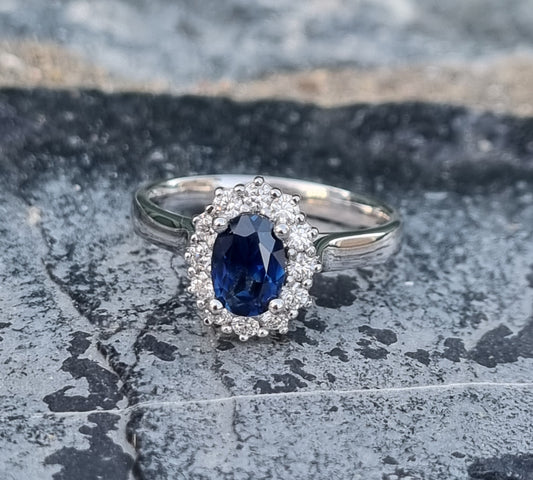 Blue Sapphire and Diamond White Gold Halo Ring