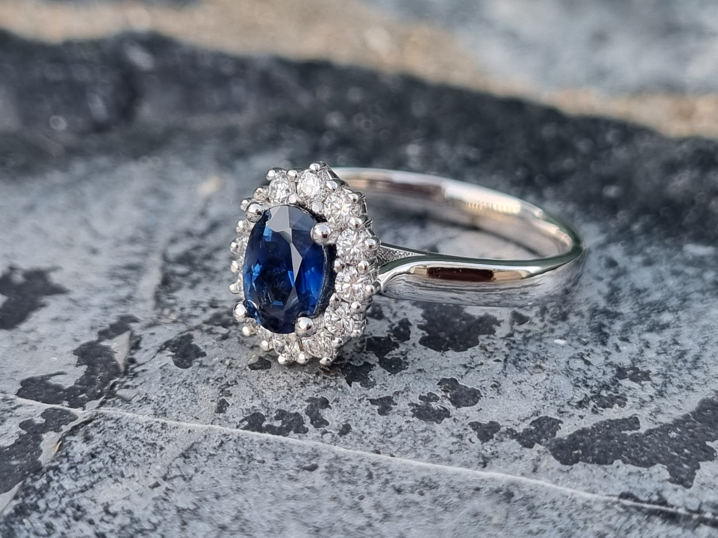 Blue Sapphire and Diamond White Gold Halo Ring