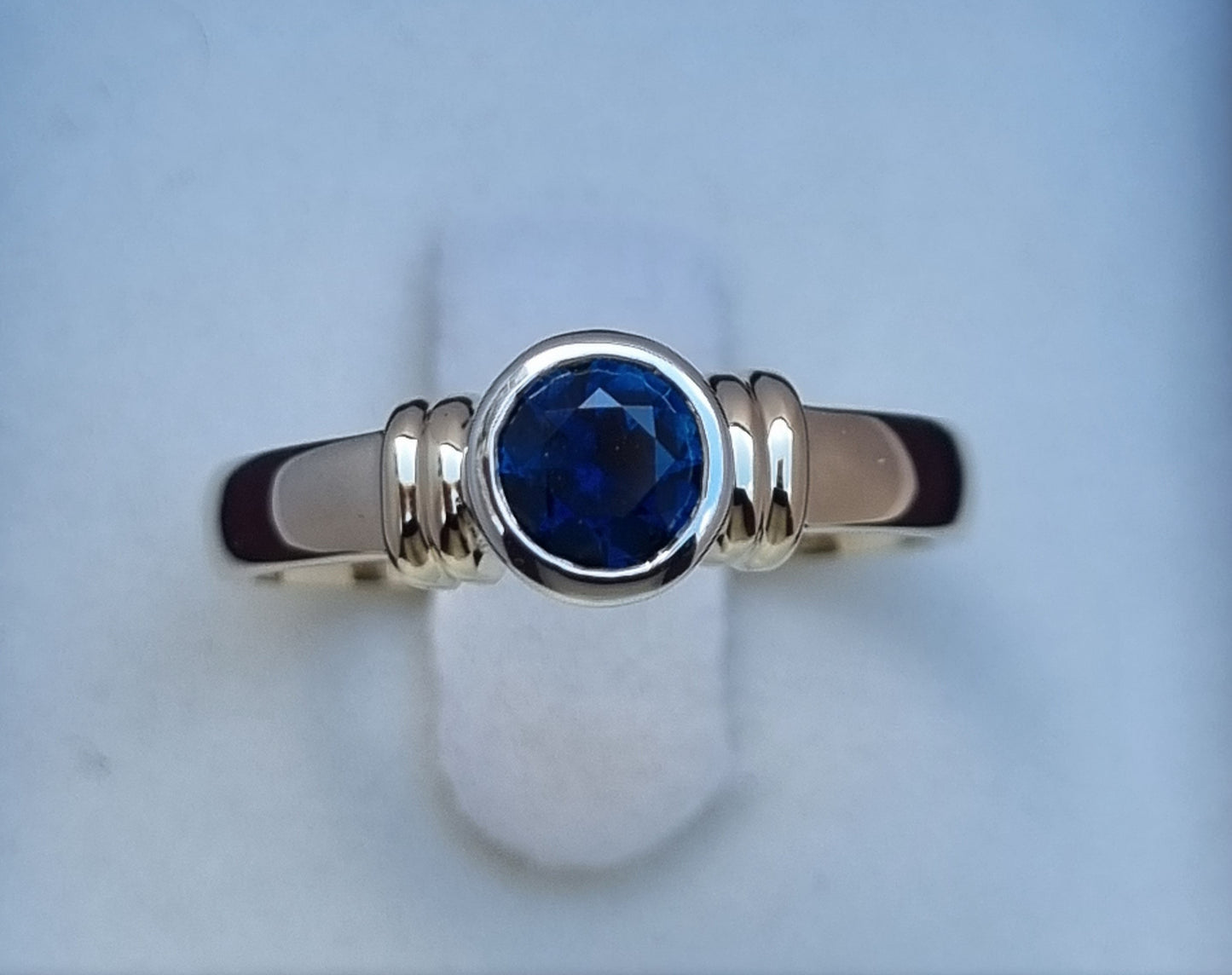 Bezel set Solitaire Blue Sapphire Ring