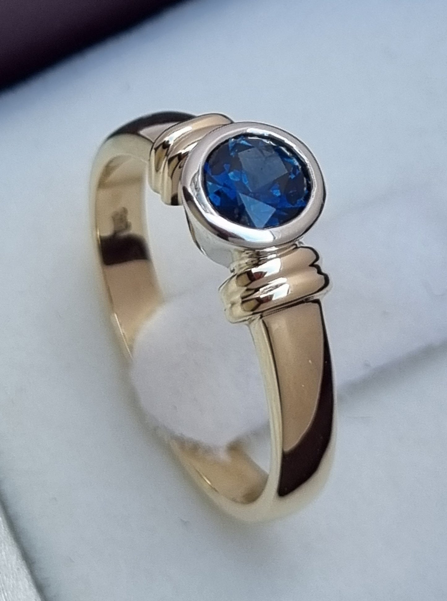 Bezel set Solitaire Blue Sapphire Ring