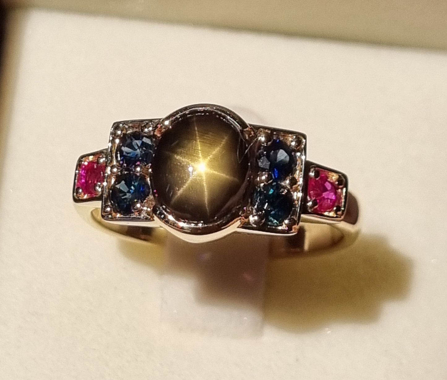 Bronze Star Sapphire, Blue Sapphire and Ruby Ring                             Design Ref: #01818