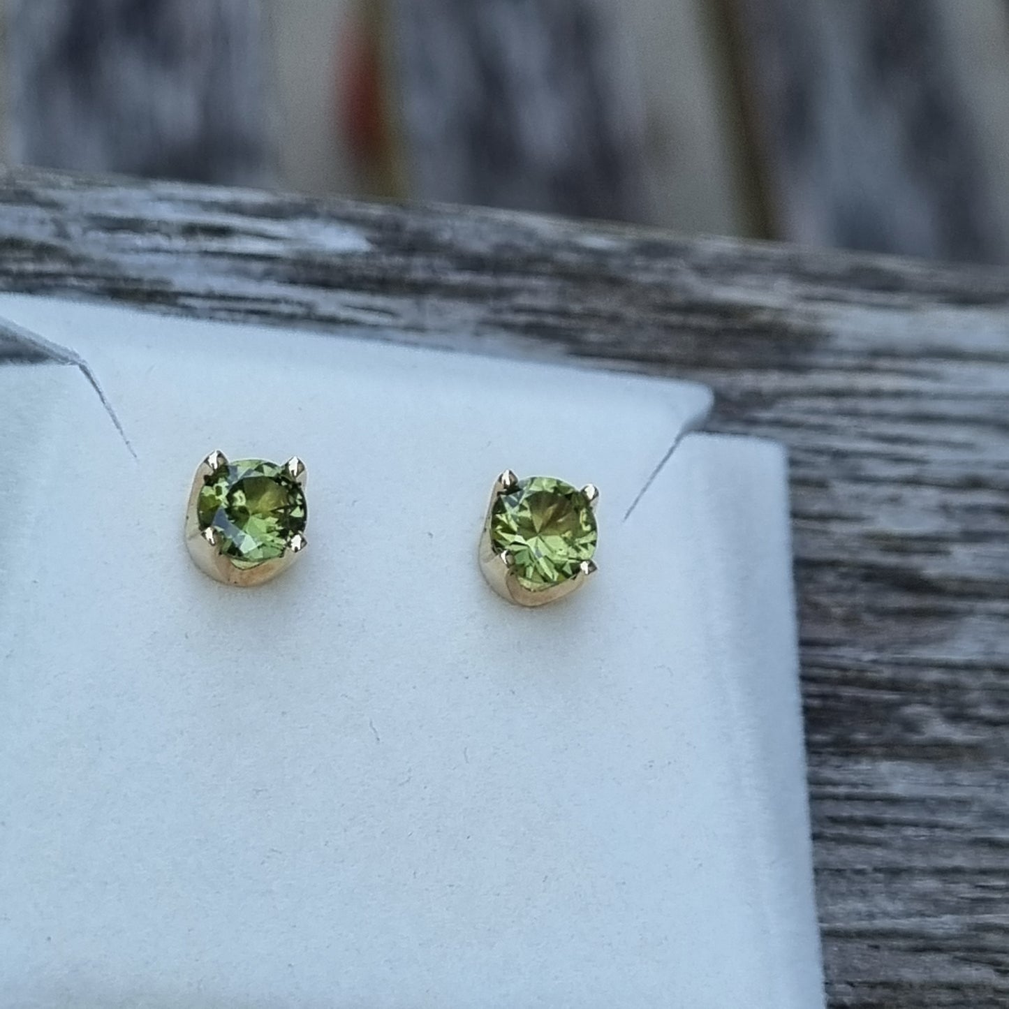 Classic 4 claw style earring studs set with Light Green Sapphires in 9ct Yellow Gold