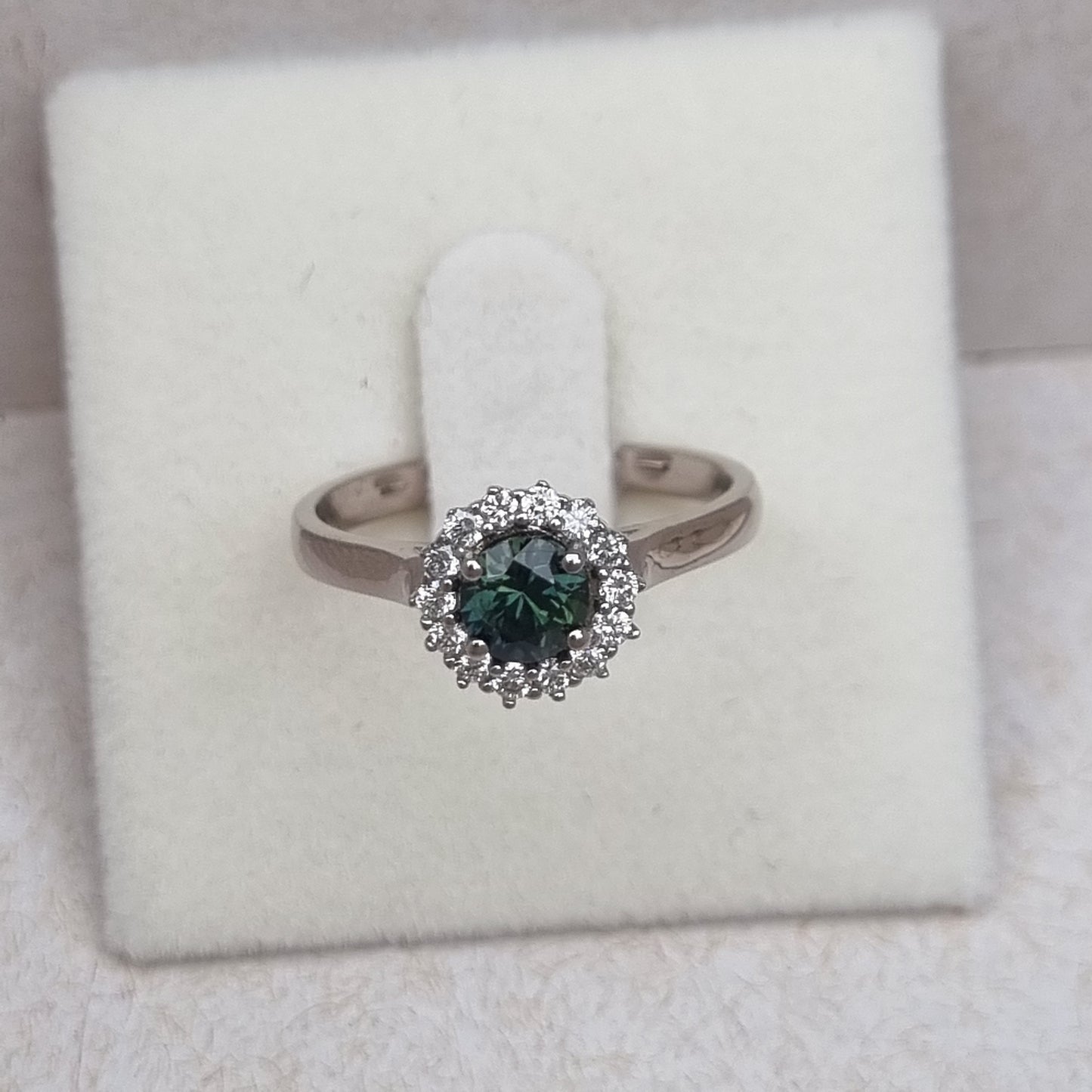 Dark Green Sapphire and Diamond Classic claw set Halo design White Gold ring   Design Ref: D359