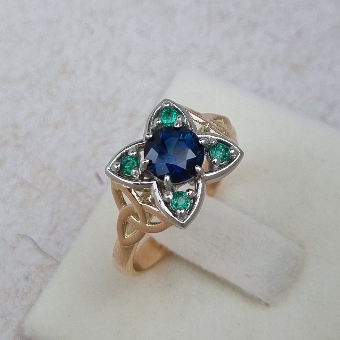 Celtic Triquetra design Blue Sapphire and Emerald ring      Design Ref:  #01682