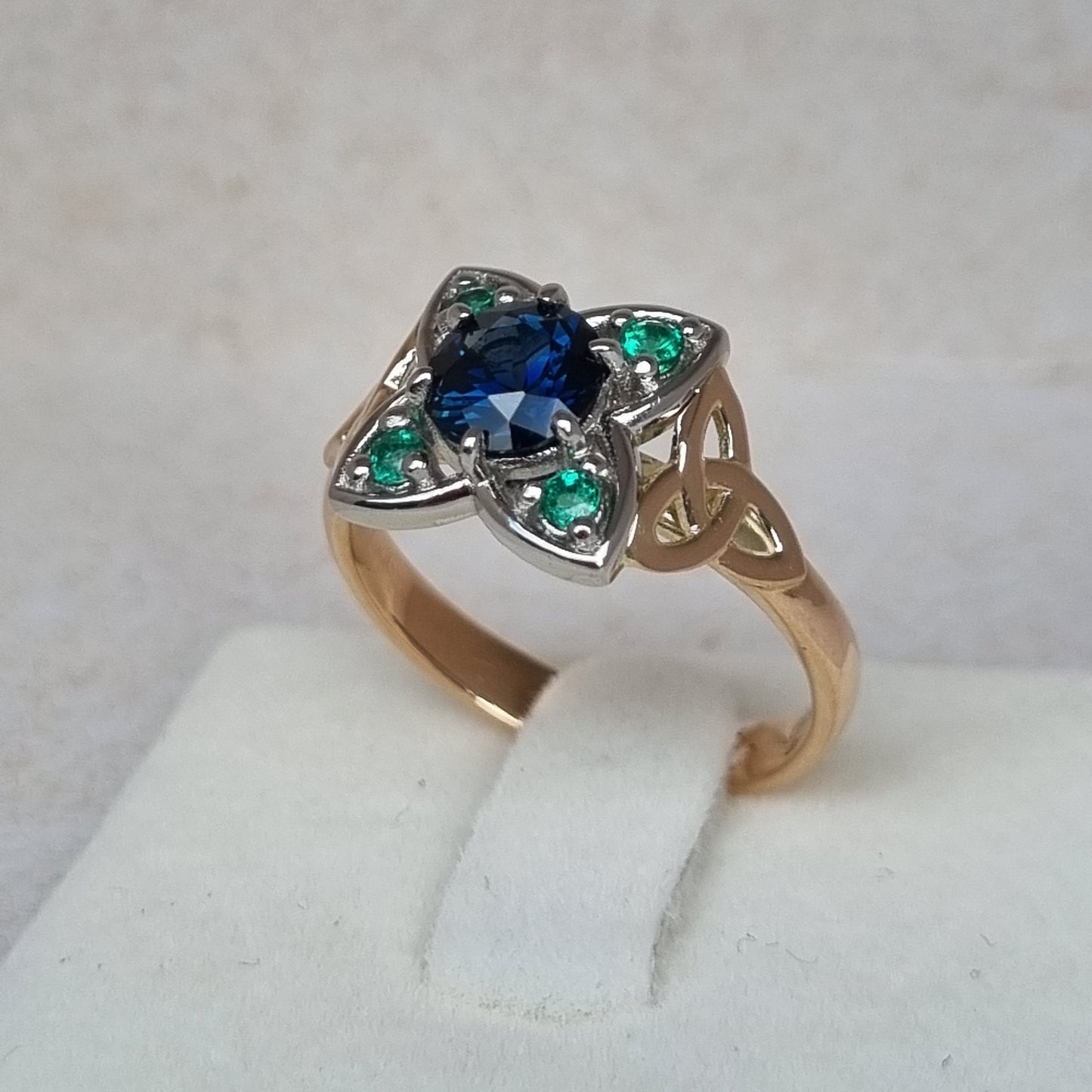 Celtic Triquetra design Blue Sapphire and Emerald ring      Design Ref:  #01682